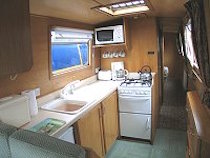 The Foxy Lark canal boat operating out of Springwood Haven