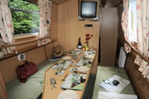 The Green Woodpecker canal boat operating out of Aldermaston